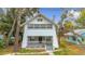 Renovated craftsman home with a white exterior and stone porch at 718 34Th S Ave, St Petersburg, FL 33705