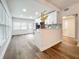 Open concept kitchen with island and stainless steel appliances at 718 34Th S Ave, St Petersburg, FL 33705