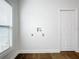 Laundry room with wood flooring, window, and hookups for washer/dryer at 718 34Th S Ave, St Petersburg, FL 33705