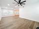 Bright living room with hardwood floors and ceiling fan at 718 34Th S Ave, St Petersburg, FL 33705