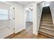 Modern staircase with carpet runner and hardwood flooring on landing at 718 34Th S Ave, St Petersburg, FL 33705