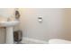 Clean and simple half bathroom with pedestal sink and toilet at 7236 Grand Elm Dr, Riverview, FL 33578