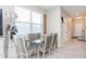 Bright dining area with glass table and four chairs at 7236 Grand Elm Dr, Riverview, FL 33578