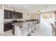 Modern kitchen with granite countertops and stainless steel appliances at 7236 Grand Elm Dr, Riverview, FL 33578