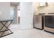 Convenient laundry room with washer and dryer at 7236 Grand Elm Dr, Riverview, FL 33578