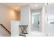 Upstairs hallway with access to bedrooms and ample space at 7236 Grand Elm Dr, Riverview, FL 33578