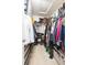 Large walk-in closet with ample shelving and hanging space at 7236 Grand Elm Dr, Riverview, FL 33578