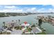Waterfront property featuring lush landscaping, serene water views, and convenient boat dock at 7800 3Rd S Ave, St Petersburg, FL 33707