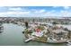 Waterfront property with backyard pool, dock, lush landscaping, and scenic water views at 7800 3Rd S Ave, St Petersburg, FL 33707