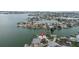 Waterfront home featuring lush landscaping and a dock on tranquil waters at 7800 3Rd S Ave, St Petersburg, FL 33707