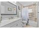 Bathroom with bathtub, shower and updated vanity at 8334 139Th Ln, Seminole, FL 33776