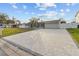 Spacious driveway and landscaped front yard at 8334 139Th Ln, Seminole, FL 33776