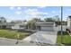 Updated single-story home with new driveway and landscaping at 8334 139Th Ln, Seminole, FL 33776