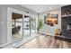 Gathering room with sliding doors opening to a pool and patio at 8334 139Th Ln, Seminole, FL 33776