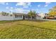 Beautiful house exterior with a large yard at 8334 139Th Ln, Seminole, FL 33776