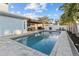 Stunning pool area with patio and lush landscaping at 8334 139Th Ln, Seminole, FL 33776