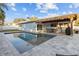 Inviting pool with patio and seating at 8334 139Th Ln, Seminole, FL 33776