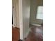 Hallway with wood floors and walls at 1209 E Dr Martin Luther King Jr Blvd, Tampa, FL 33603