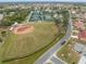 Community baseball field and surrounding area at 1209 Peridot Ln, Sun City Center, FL 33573