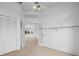 Bedroom with built-in shelving and view at 1209 Peridot Ln, Sun City Center, FL 33573