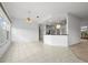 Bright dining area with tile floors and large windows at 1209 Peridot Ln, Sun City Center, FL 33573