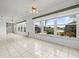Sunlit dining area with golf course views at 1209 Peridot Ln, Sun City Center, FL 33573