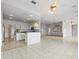 Open kitchen with breakfast bar and views at 1209 Peridot Ln, Sun City Center, FL 33573