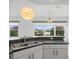Kitchen features a breakfast bar and a view at 1209 Peridot Ln, Sun City Center, FL 33573