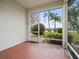 Screened patio overlooking a pond and golf course at 1209 Peridot Ln, Sun City Center, FL 33573
