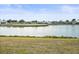 Waterfront view of a peaceful lake and golf course at 1209 Peridot Ln, Sun City Center, FL 33573