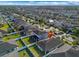 Aerial view of house and surrounding neighborhood, showcasing the community and location at 12410 Ballentrae Forest Dr, Riverview, FL 33579