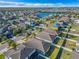 Aerial view of house and surrounding neighborhood, showcasing the community and location at 12410 Ballentrae Forest Dr, Riverview, FL 33579