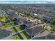 Aerial view of house and surrounding neighborhood, showcasing the community and location at 12410 Ballentrae Forest Dr, Riverview, FL 33579
