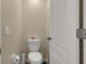 Small half bathroom with toilet and single sink at 12410 Ballentrae Forest Dr, Riverview, FL 33579