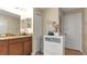 Bathroom with granite countertop and a large vanity at 12410 Ballentrae Forest Dr, Riverview, FL 33579