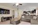 Living room showcases a large sectional sofa and open floor plan at 12410 Ballentrae Forest Dr, Riverview, FL 33579