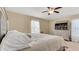 Large main bedroom with a king-size bed and plenty of natural light at 12410 Ballentrae Forest Dr, Riverview, FL 33579