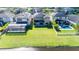 Aerial view of house, pool, and surrounding community at 19510 Whispering Brook Dr, Tampa, FL 33647