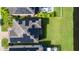 Aerial view showing home with solar panels and a large backyard at 19510 Whispering Brook Dr, Tampa, FL 33647