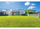 Large backyard with spacious lawn and privacy fence at 19510 Whispering Brook Dr, Tampa, FL 33647