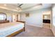 Spacious bedroom with plush carpeting and en-suite bathroom access at 19510 Whispering Brook Dr, Tampa, FL 33647