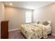 Cozy bedroom with a queen-size bed and neutral decor at 19510 Whispering Brook Dr, Tampa, FL 33647