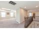Spacious bonus room with neutral walls and carpeting at 19510 Whispering Brook Dr, Tampa, FL 33647