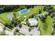 Aerial view showing community pool and sports courts at 19510 Whispering Brook Dr, Tampa, FL 33647