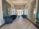 Elegant community clubhouse lobby with comfortable seating at 20249 Symphony Pl, Venice, FL 34293
