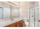 Bathroom with shower, vanity, and toilet at 2029 Inverness Greens Dr # 2029, Sun City Center, FL 33573