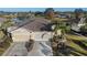 An aerial view of a house with a two-car garage at 2029 Inverness Greens Dr # 2029, Sun City Center, FL 33573