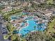 Resort-style pool with tennis courts at 2029 Inverness Greens Dr # 2029, Sun City Center, FL 33573