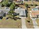 Aerial view of a single-story house with a pool and large backyard at 2139 Abby Ave, Spring Hill, FL 34609