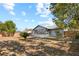 Large backyard with a wooden fence at 2139 Abby Ave, Spring Hill, FL 34609